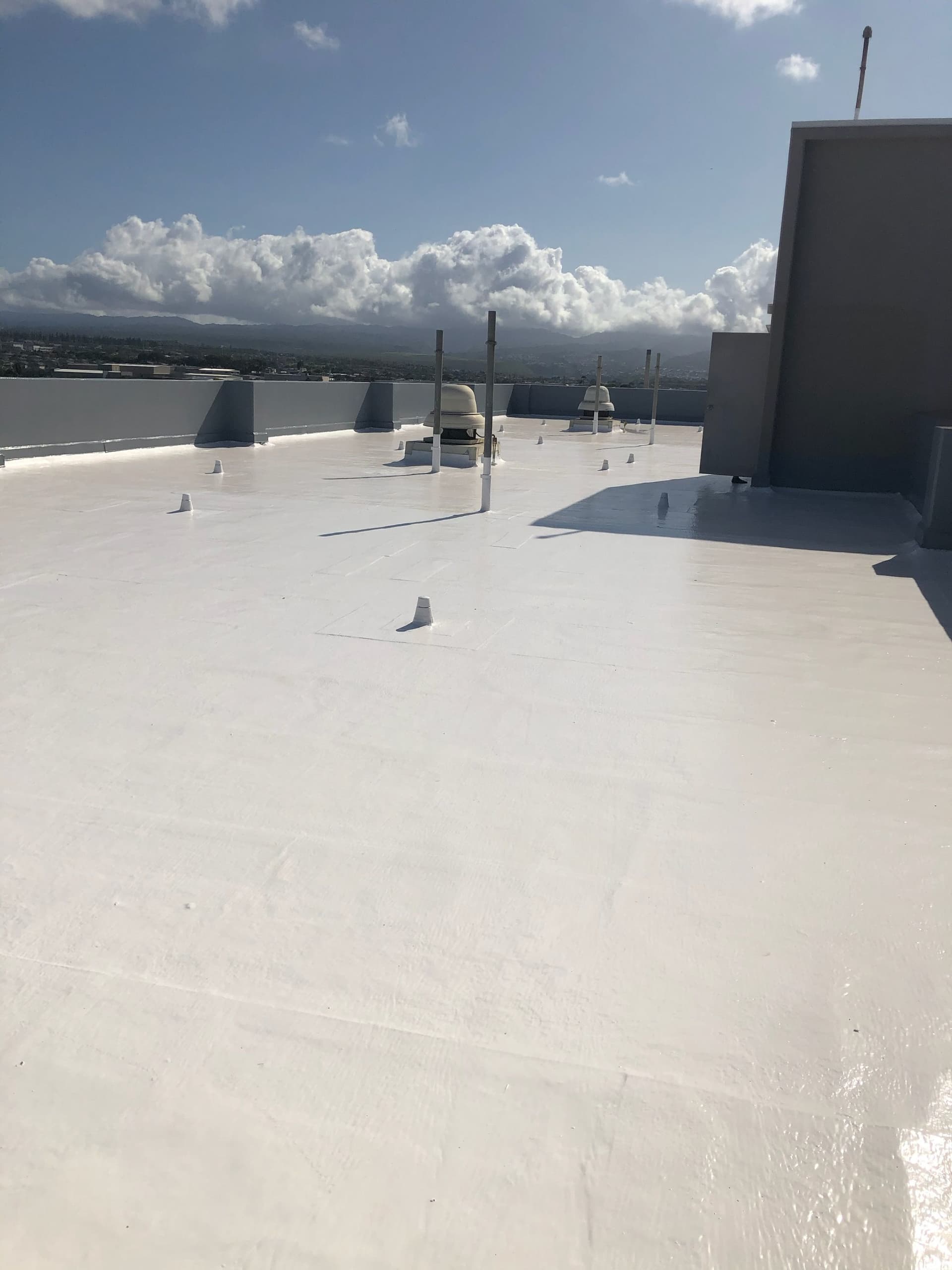 Flat White Rooftop Excellence with All Around Roofing image