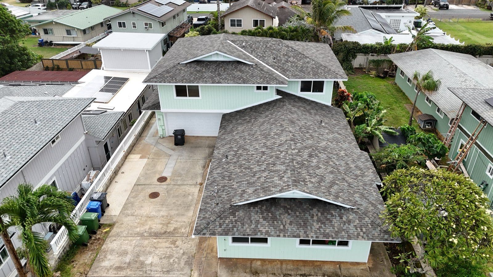 Eco-Friendly Roofing for a Mint-Green Home image